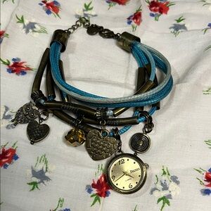 Decree Blue Multi-Strand Charm Bracelet Watch with Antique Brass Charms